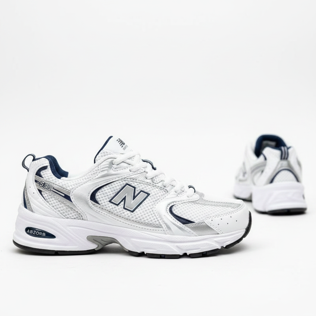 New Balance 530 Blanco Plata vista lateral